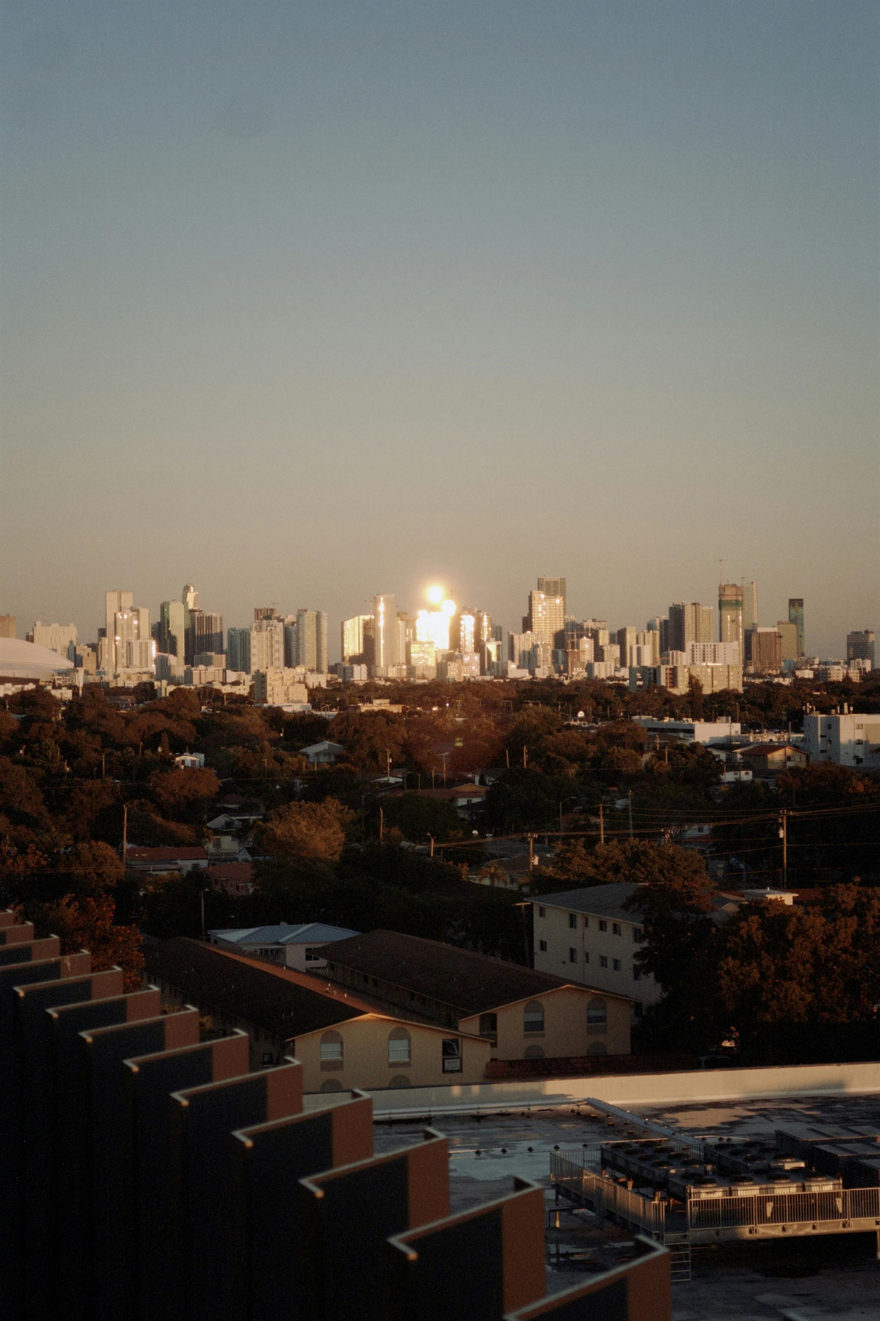 Miami skyline at sunset with warm coastal high-rise light for the daddy Florida state guide.